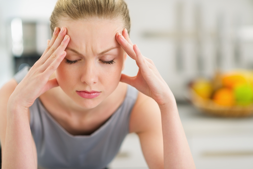 Woman experiencing tension headache
