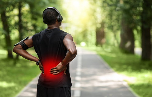 Long distance runner with back pain