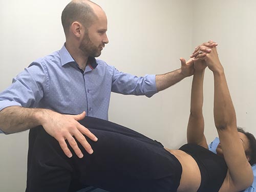 Osteopath Gavin Smith performing treatment at London osteopathy clinic